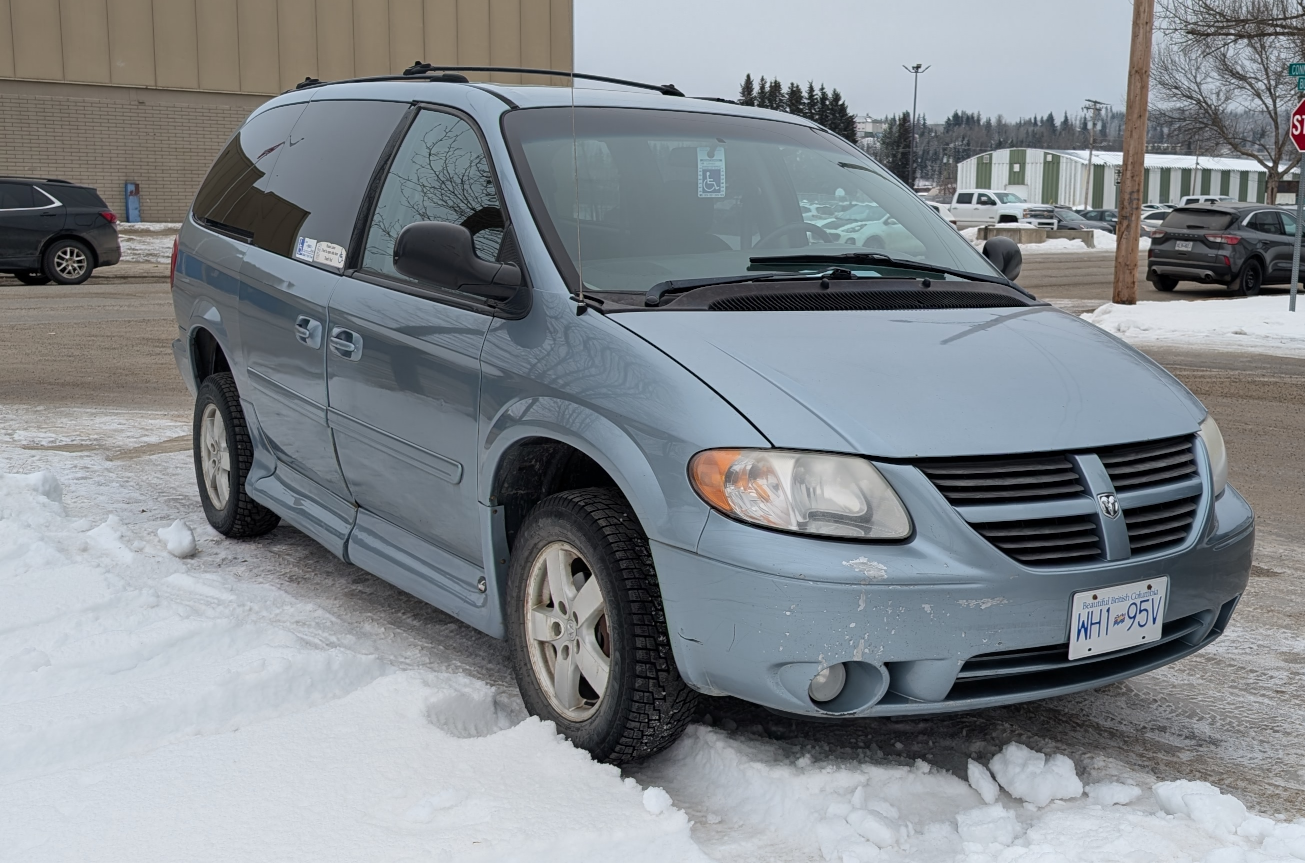 Charis Care-a-Van: A blue accessible Dodge Grand Caravan